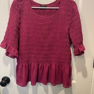 Torrid Women's Pink Smocked Top size 2.   

0028